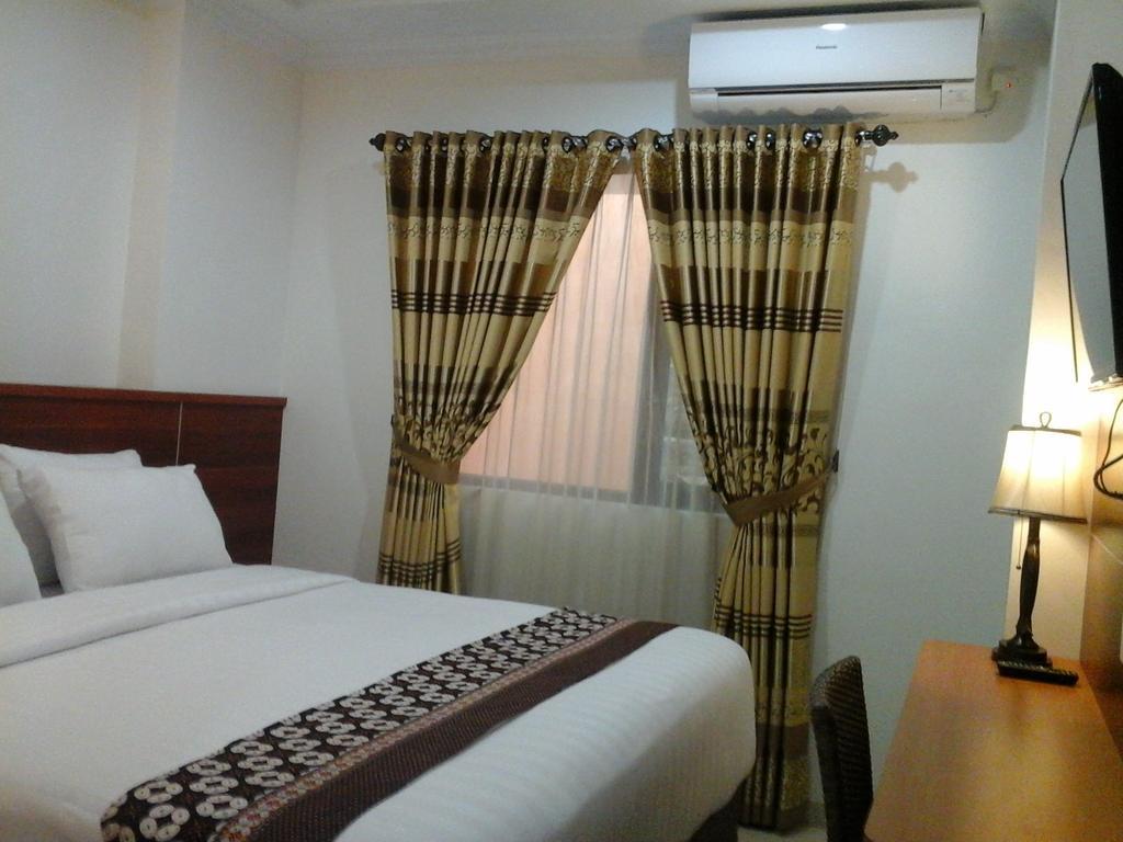 Maranatha Grand Hotel Джок'якарта Номер фото